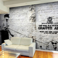 Fotobehang - Banksy Graffiti Area - Vliesbehang